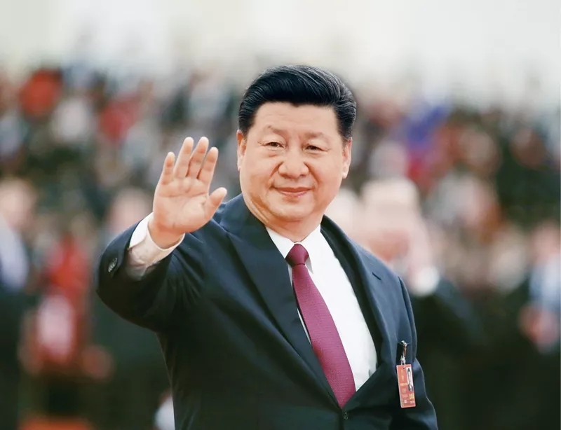 2018年3月20日,第十三届全国人民代表大会第一次会议在北京人民大会堂闭幕。这是习近平向代表挥手致意。 新华社记者 兰红光/摄